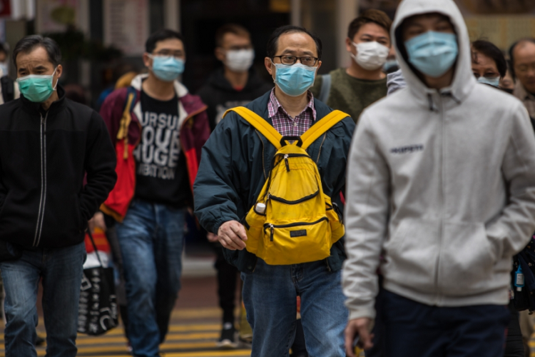 بكين تلغي إلزام السكان بارتداء الكمامات